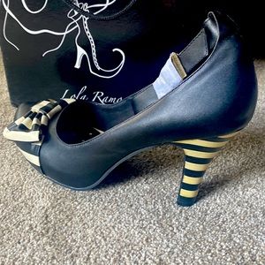 Brand new leather pumps -rare - striped heel